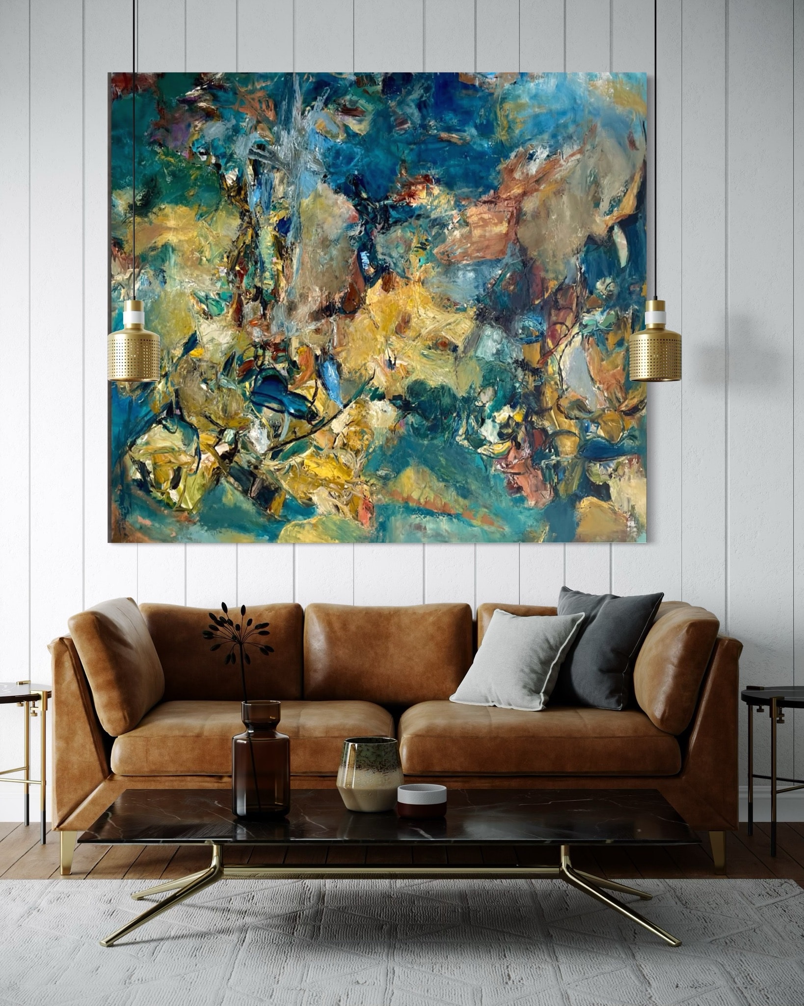 Abstract painting above leather sofa