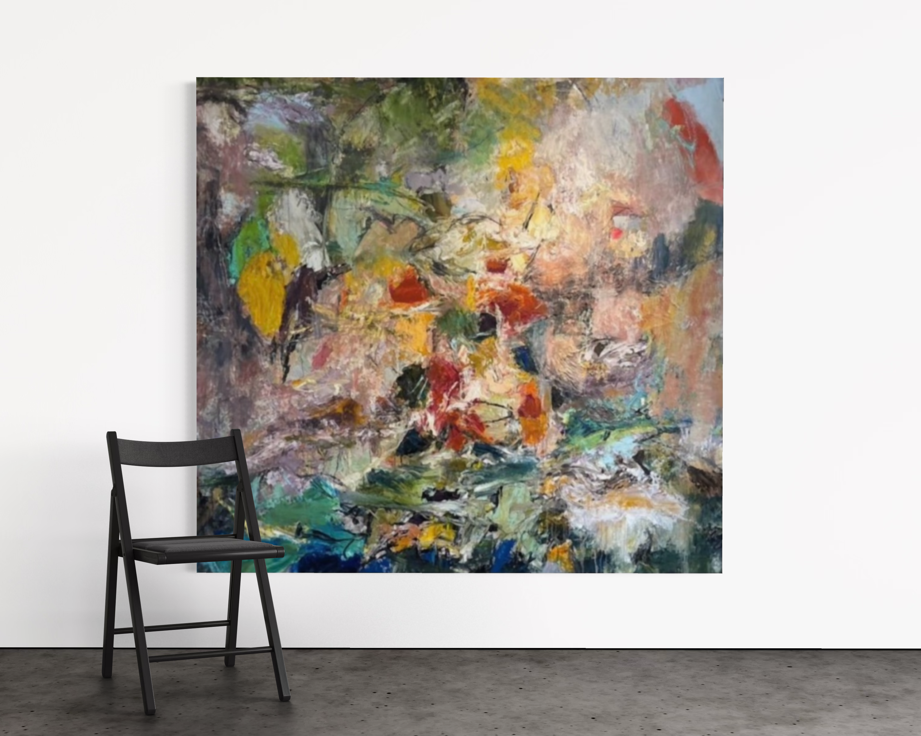 Large colourful abstract painting with greens, yellows, reds and blues leaning against white gallery wall beside black folding chair